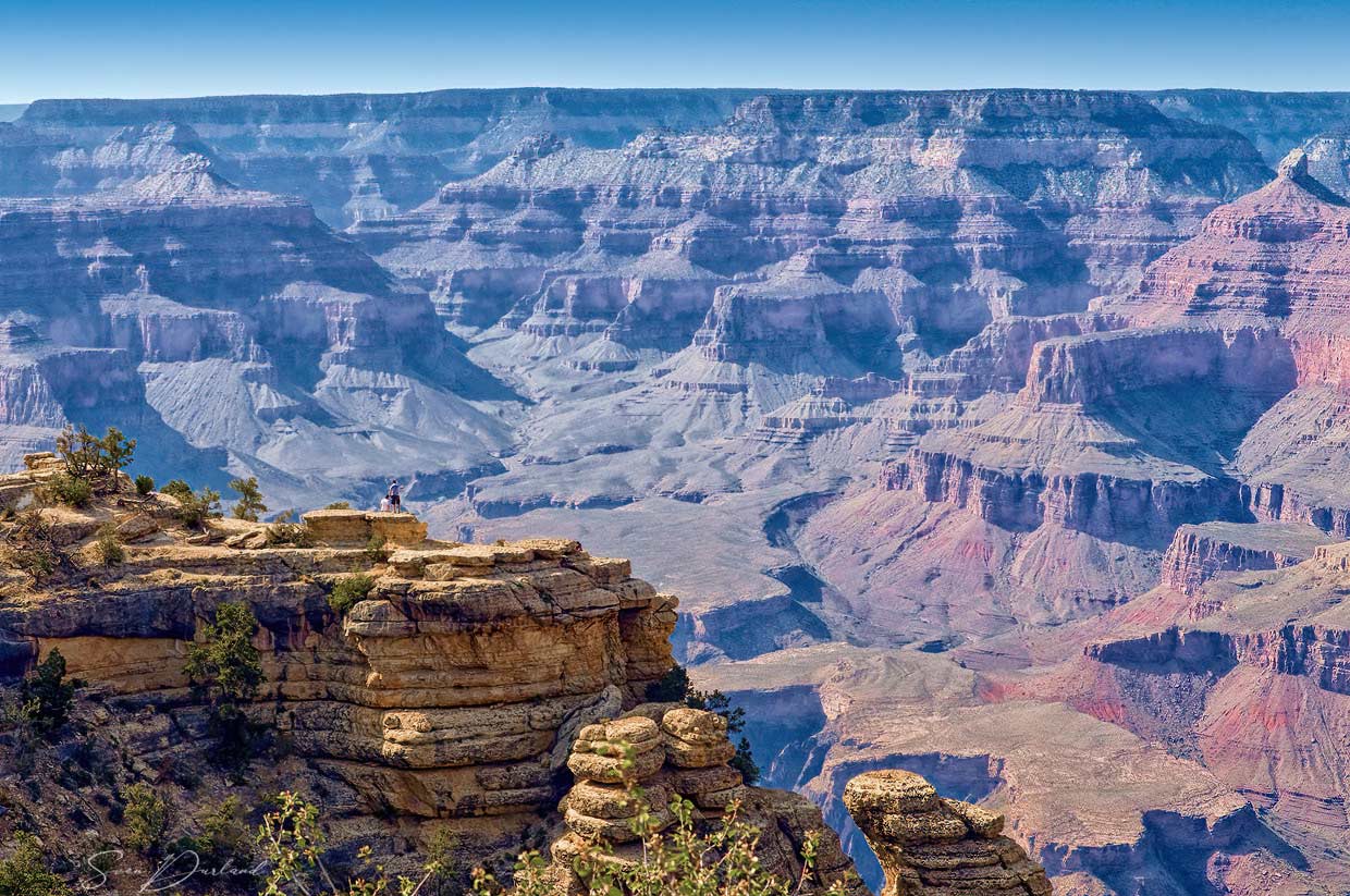 Grand canyon view with two men